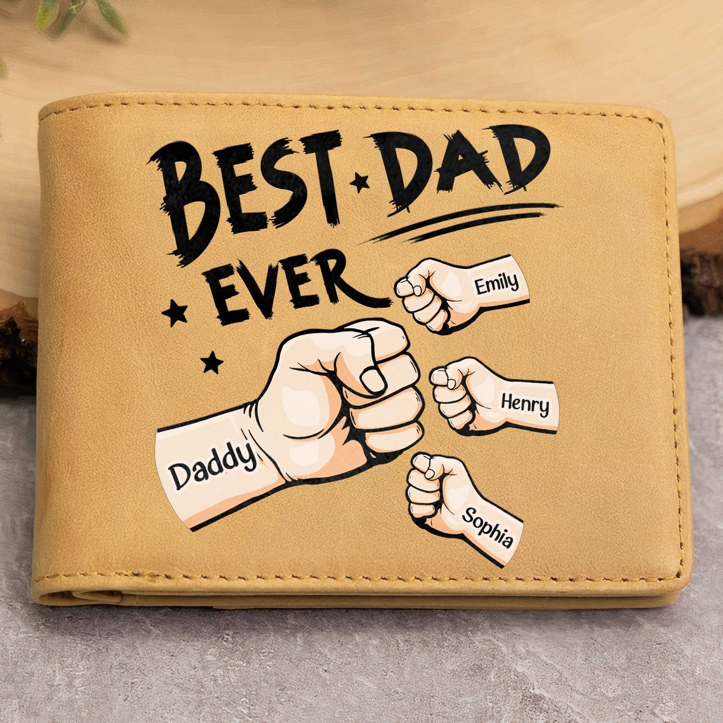 Personalized Best Dad Ever leather wallet with fist bump design for Emily, Henry, and Sophia.