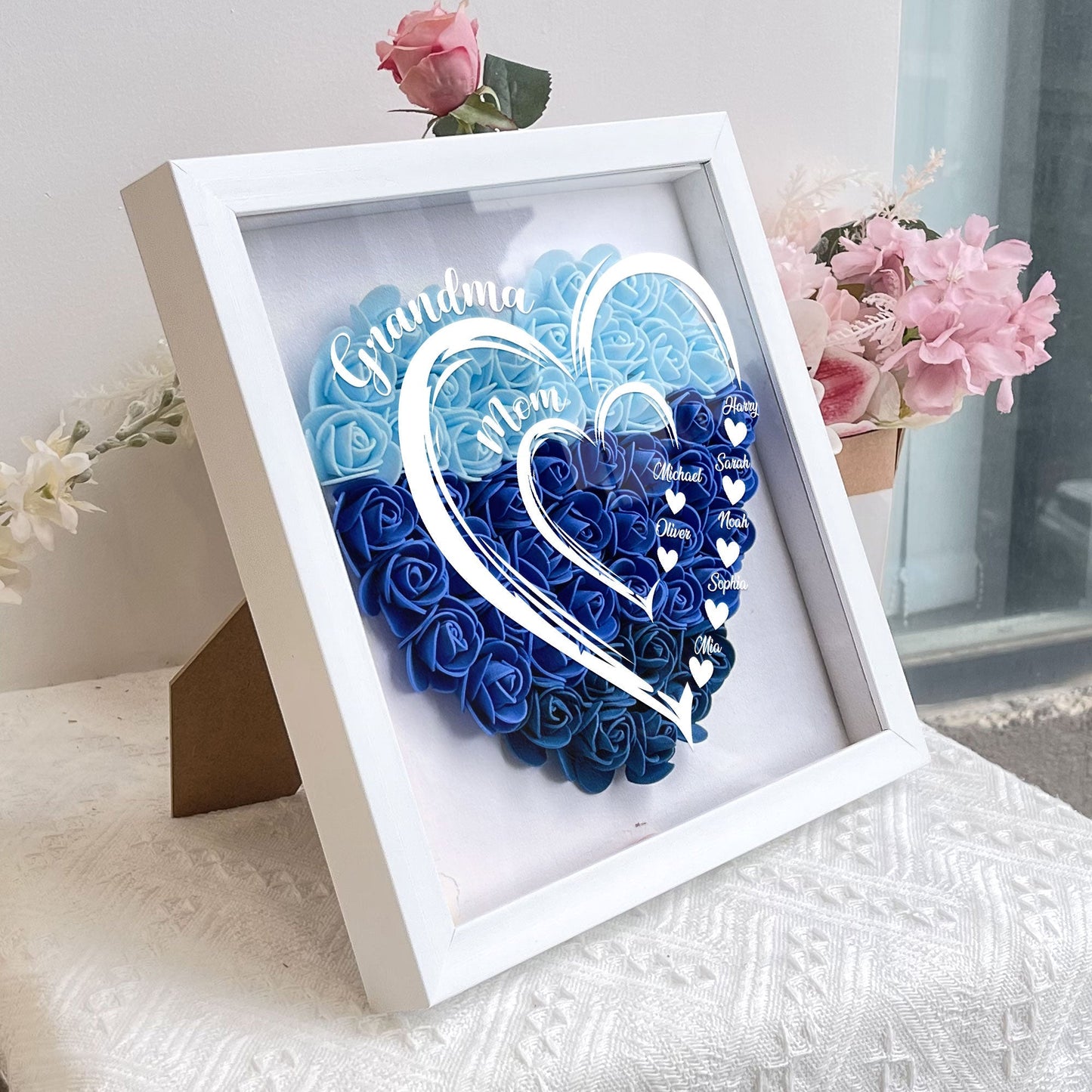 Personalized blue heart flower shadow box for Mom in white frame, a perfect Mother's Day gift.