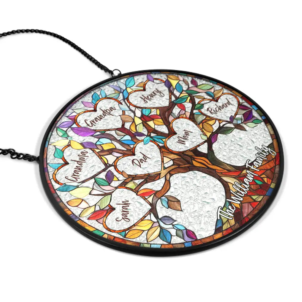 Personalized Tree of Life stained glass window hanging with family names, colorful design.