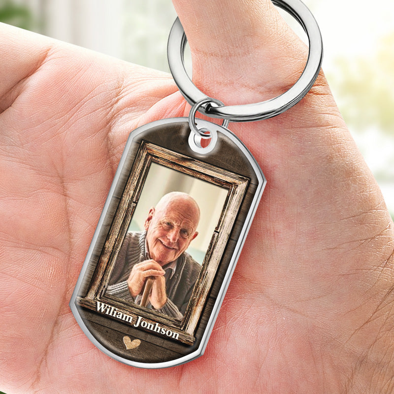Personalized photo keychain, stainless steel, featuring a printed image, perfect memorial gift.
