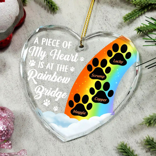 Personalized Rainbow Bridge Pet Memorial Ornament with Paw Prints. Heart-shaped glass with rainbow design.